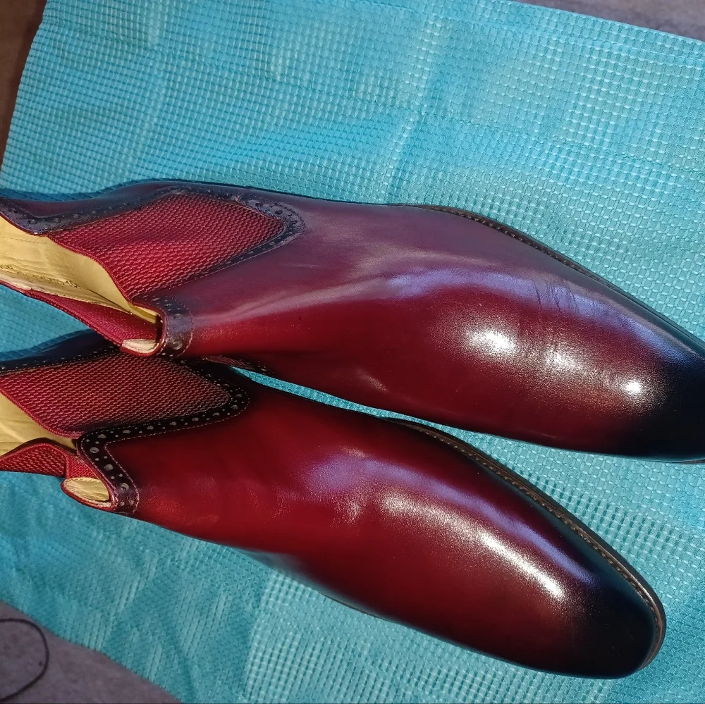 Red and Black Leather Boots with Sleek Design